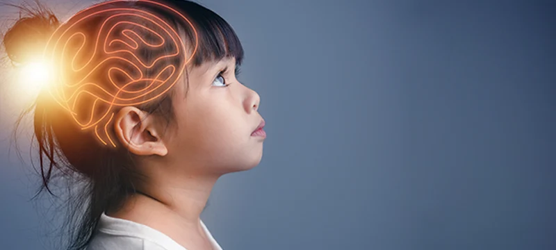 Young girl with brain graphic overlaid